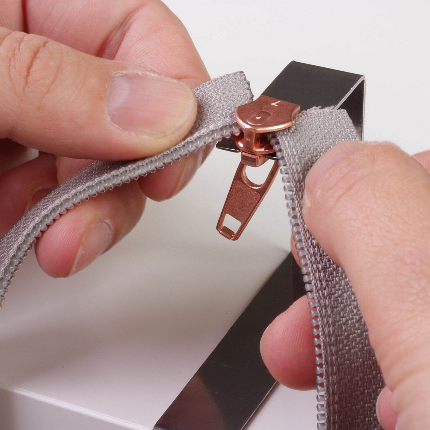 Zippereinfädler 