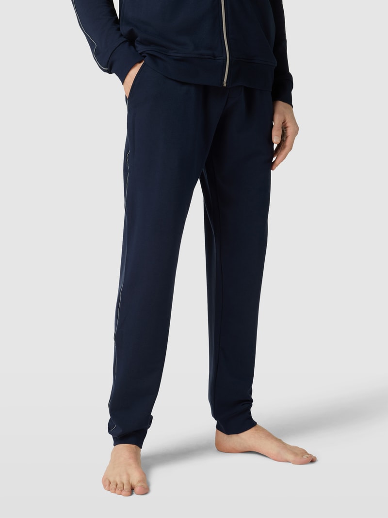 Sweatpants mit Kontrastpaspeln in dunkelblau