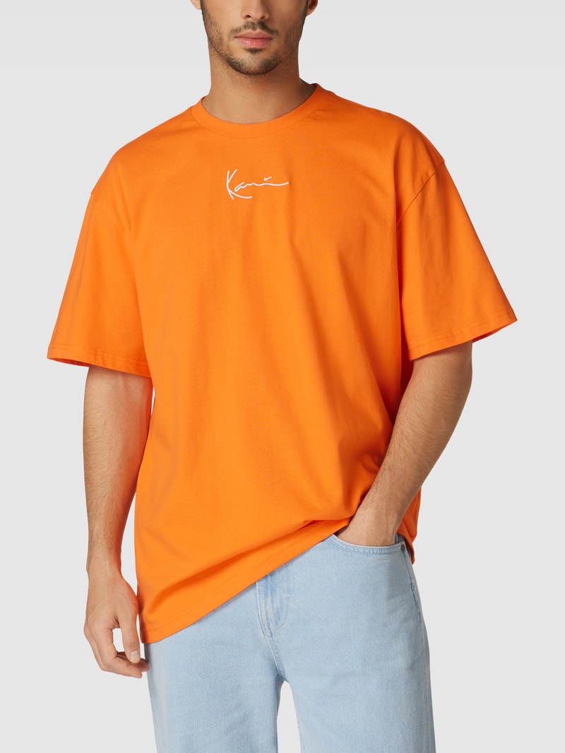Oversized T-Shirt mit Label-Stitching - P&C X Karl Kani in dunkel orange
