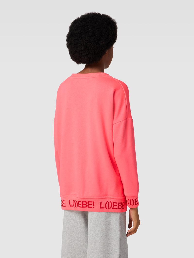 Sweatshirt mit Ziersteinbesatz Modell 'L(I)EBE!' in pink