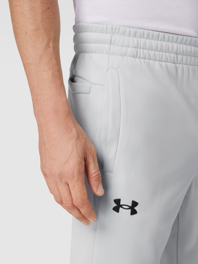 Sweatpants mit Logo-Print Modell 'Armour Fleece Joggers' in hellgrau