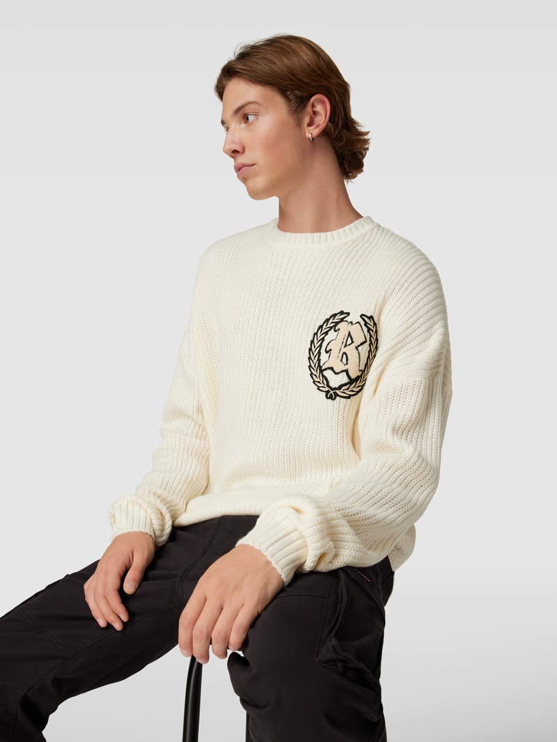 Strickpullover mit überschnittenen Schultern in ecru