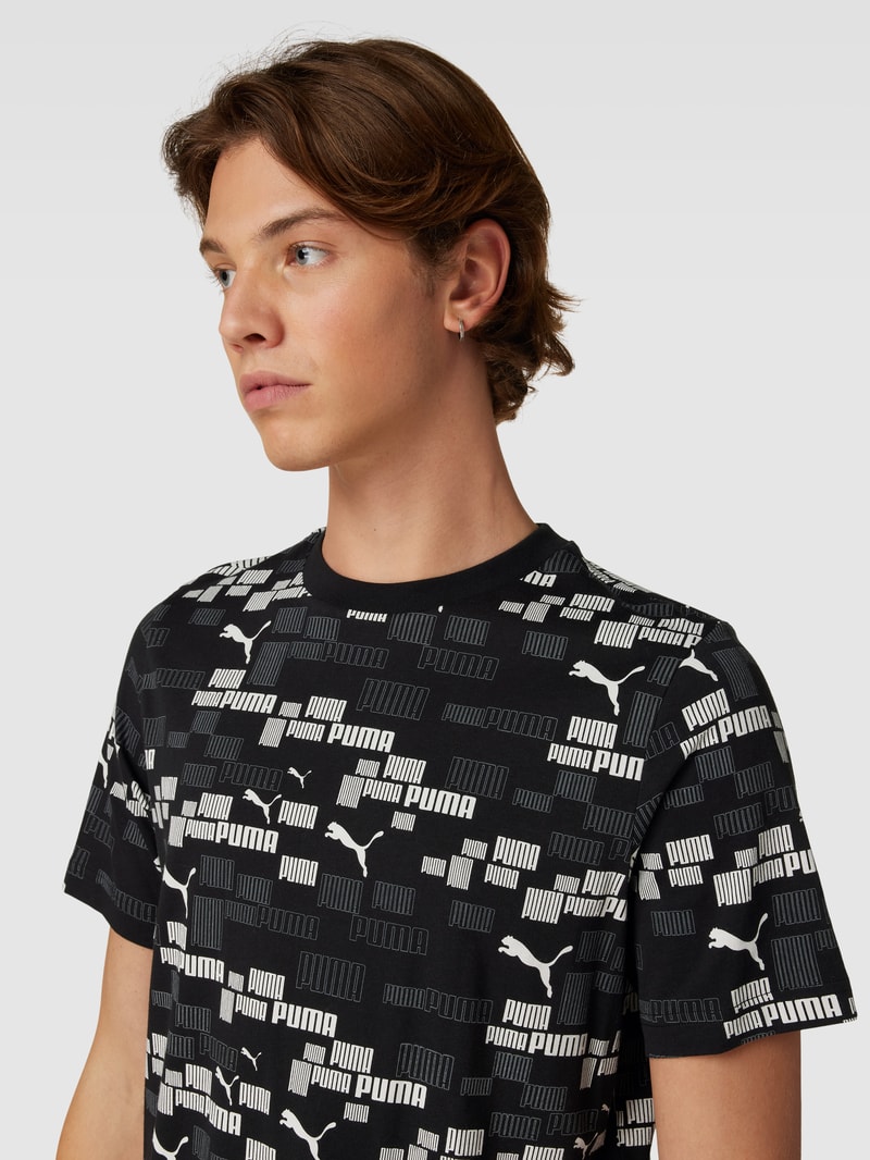 T-Shirt mit Allover-Logo-Print in schwarz