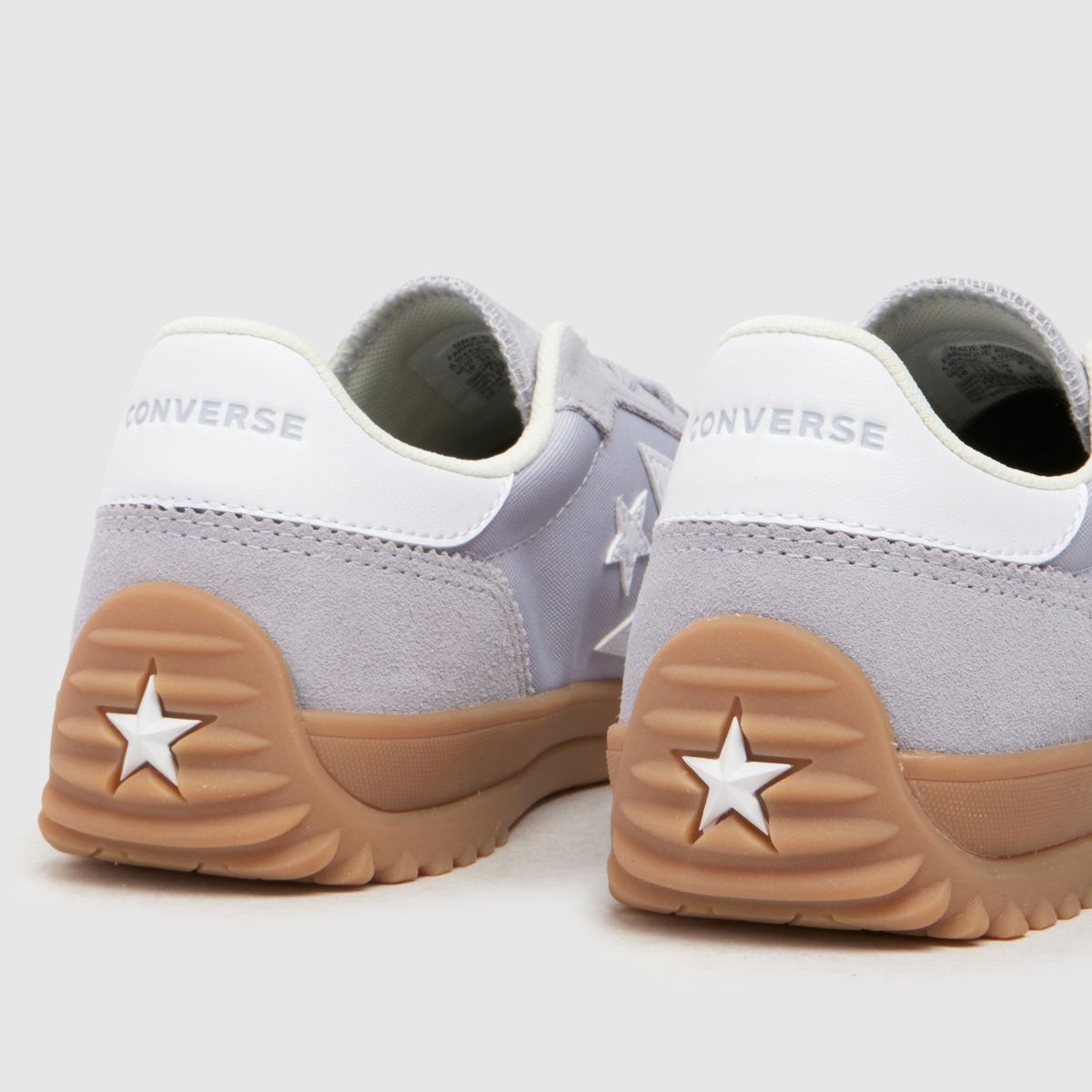Converse – Grå löparskor med stjärnmönster