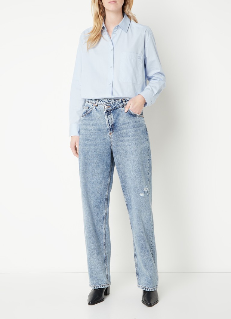Camicia oversize HUGO BOSS con taschino sul petto e logo ricamato.