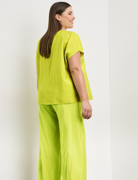 Fein schimmerndes Blusenshirt