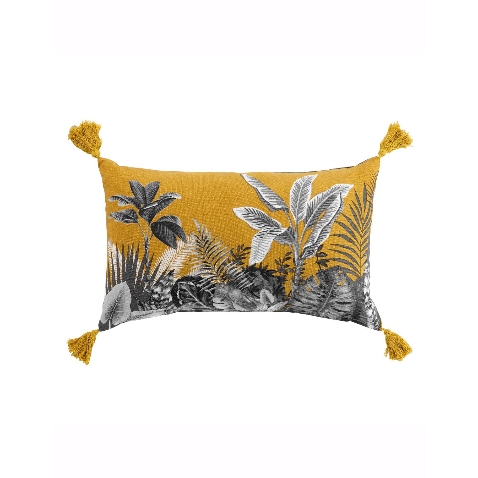 Coussin imprimé tropical pompons