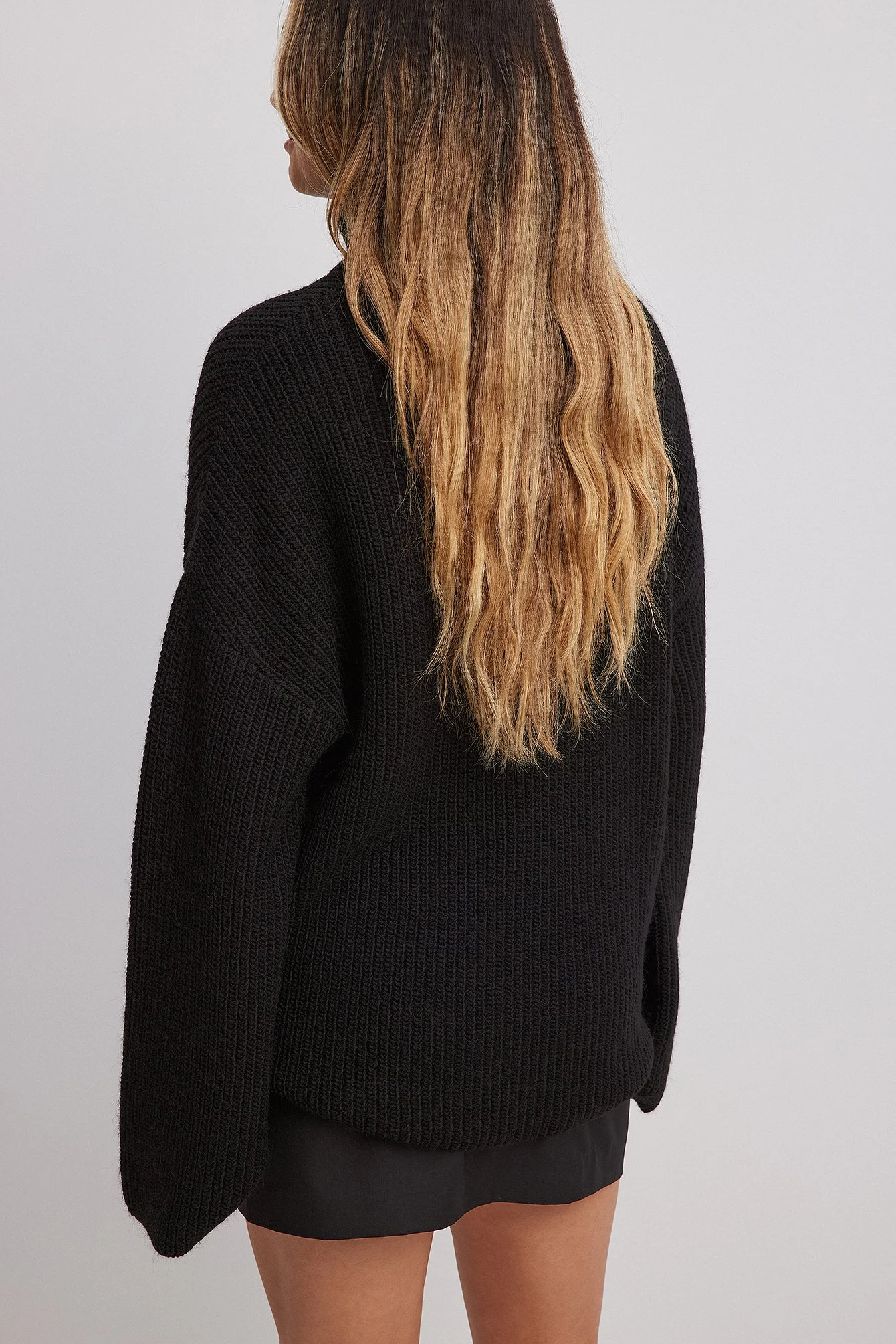 Langer Rollkragen-Strickpullover