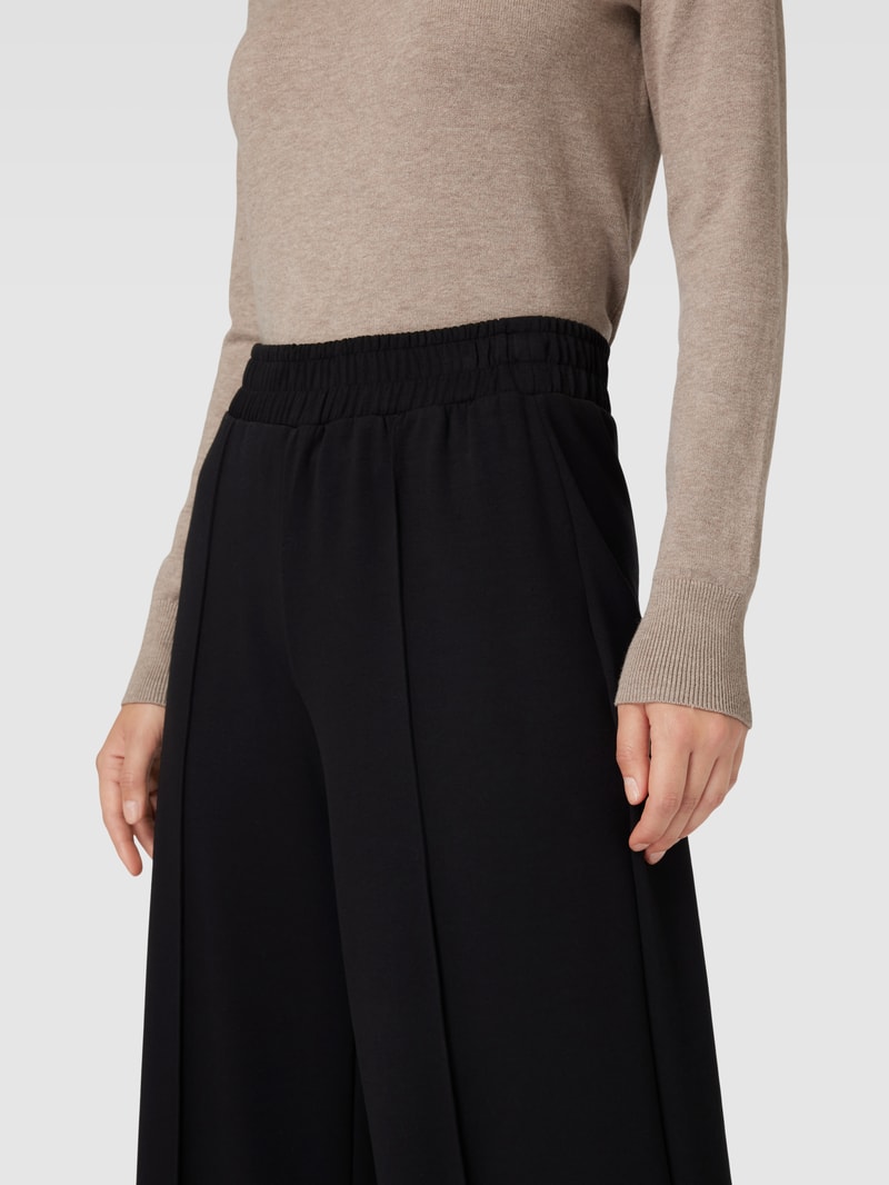 Stoffhose mit elastischem Bund in schwarz