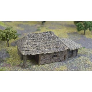 Big peasant hut with pigsty