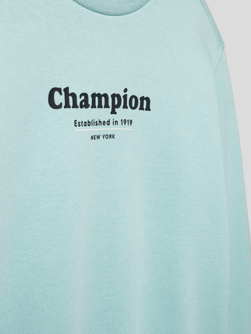 Sweatshirt mit Motiv- und Statement-Print Modell 'Rochester' in helltürkis