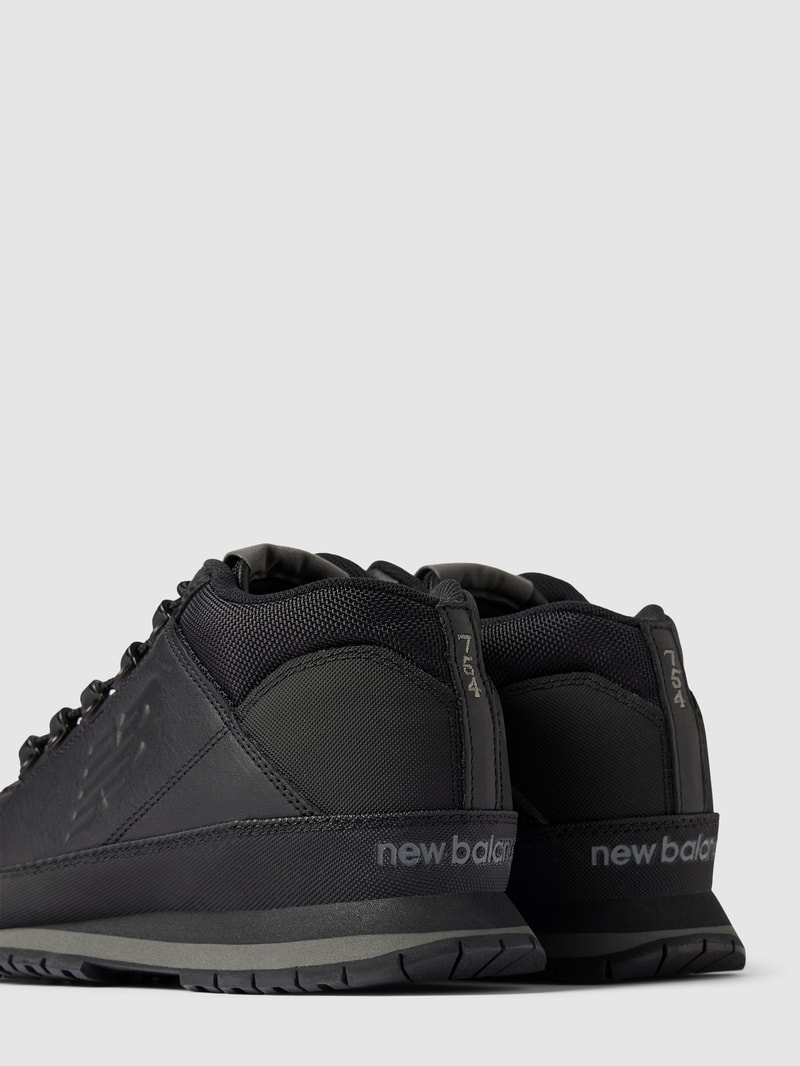 Sneaker aus echtem Leder in schwarz
