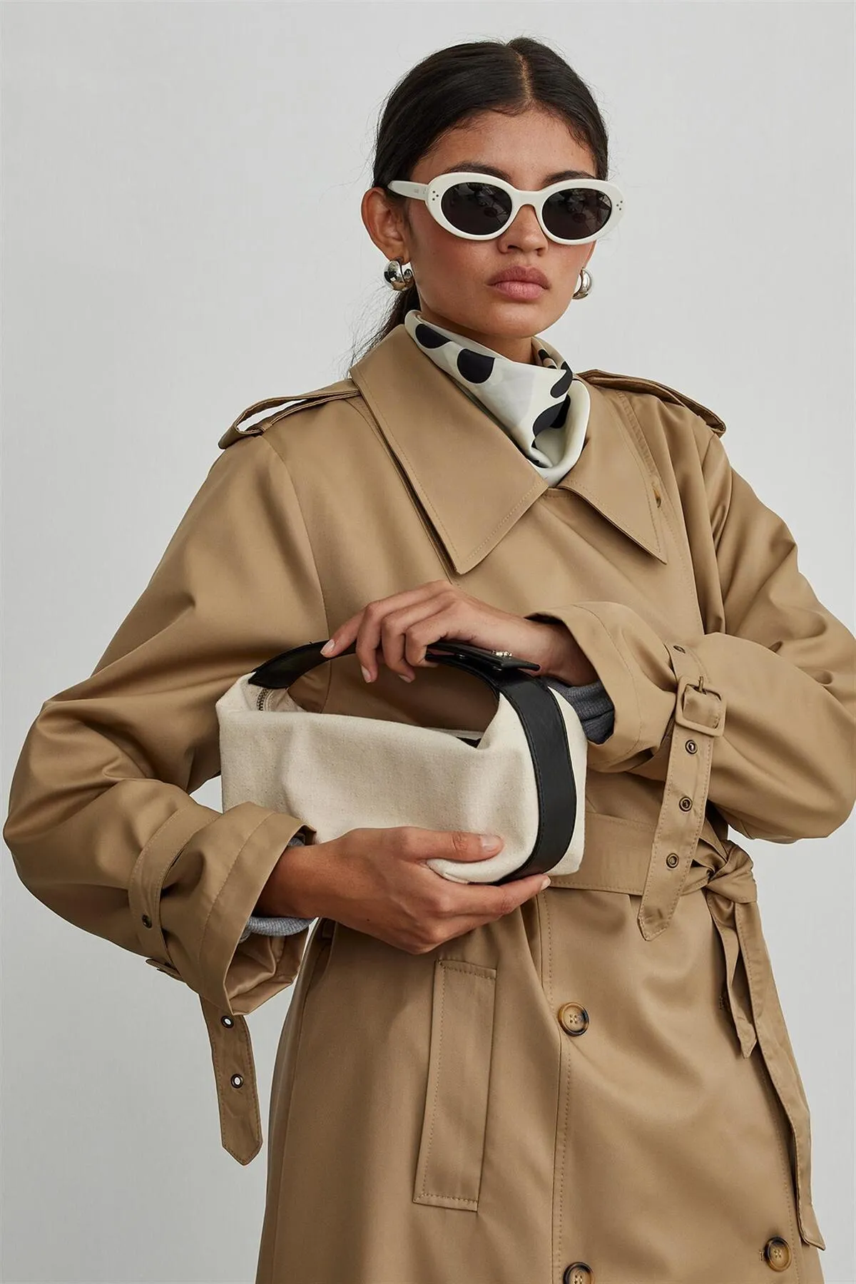 Suud Collection  Cremefarbene Mini-Tasche „Archi“