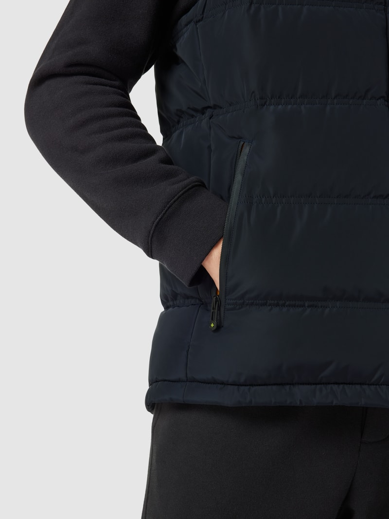 Steppweste mit Label-Applikation Modell 'SNOWDOME VEST' in marineblau