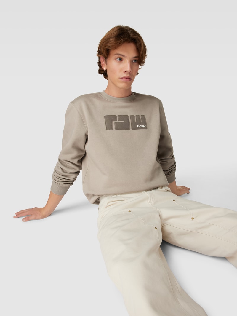 Sweatshirt mit Label-Stitching Modell 'RAW.' in beige