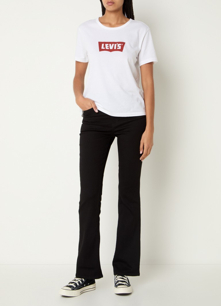 Blugi evazați cu talie înaltă de la Levi's 725, de culoare decolorată.