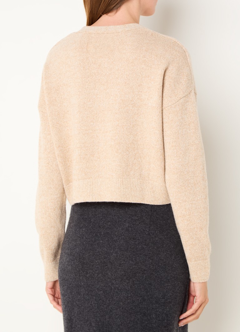 Gilet in lana pregiata con ricamo a forma di armi.