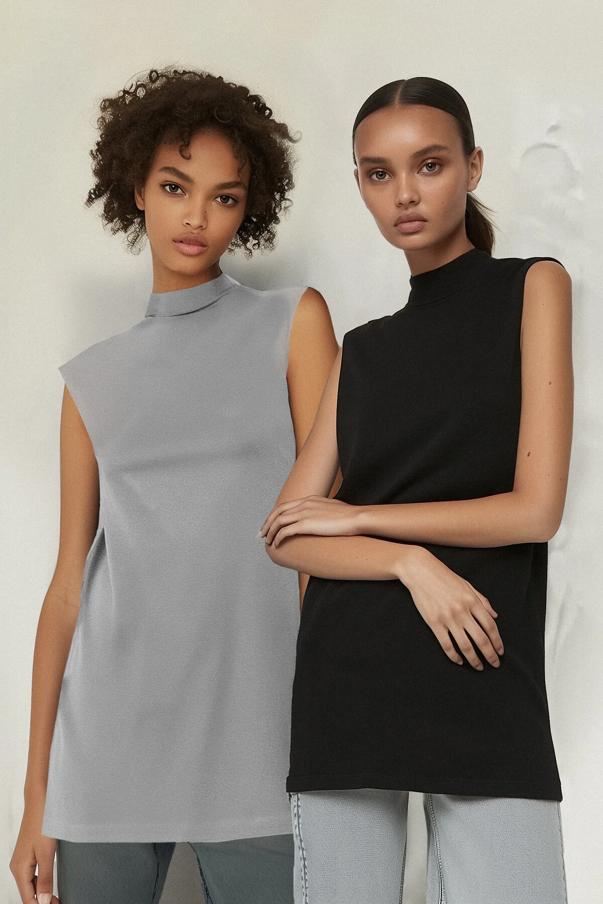 Trendyol Modest  Schwarz-Graues 2er-Pack ärmellose Unterwäsche-Liner-Tunika mit Stehkragen TCTSS21UK0033