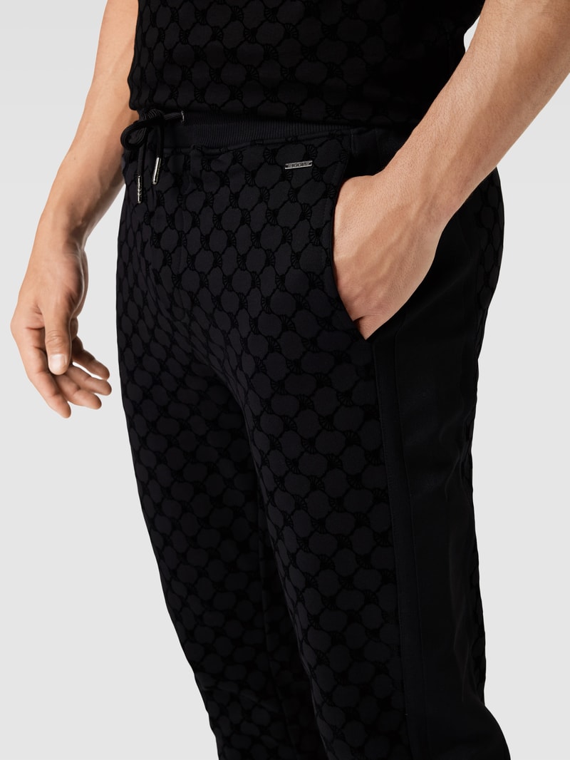 Sweatpants mit Allover-Label-Print in schwarz