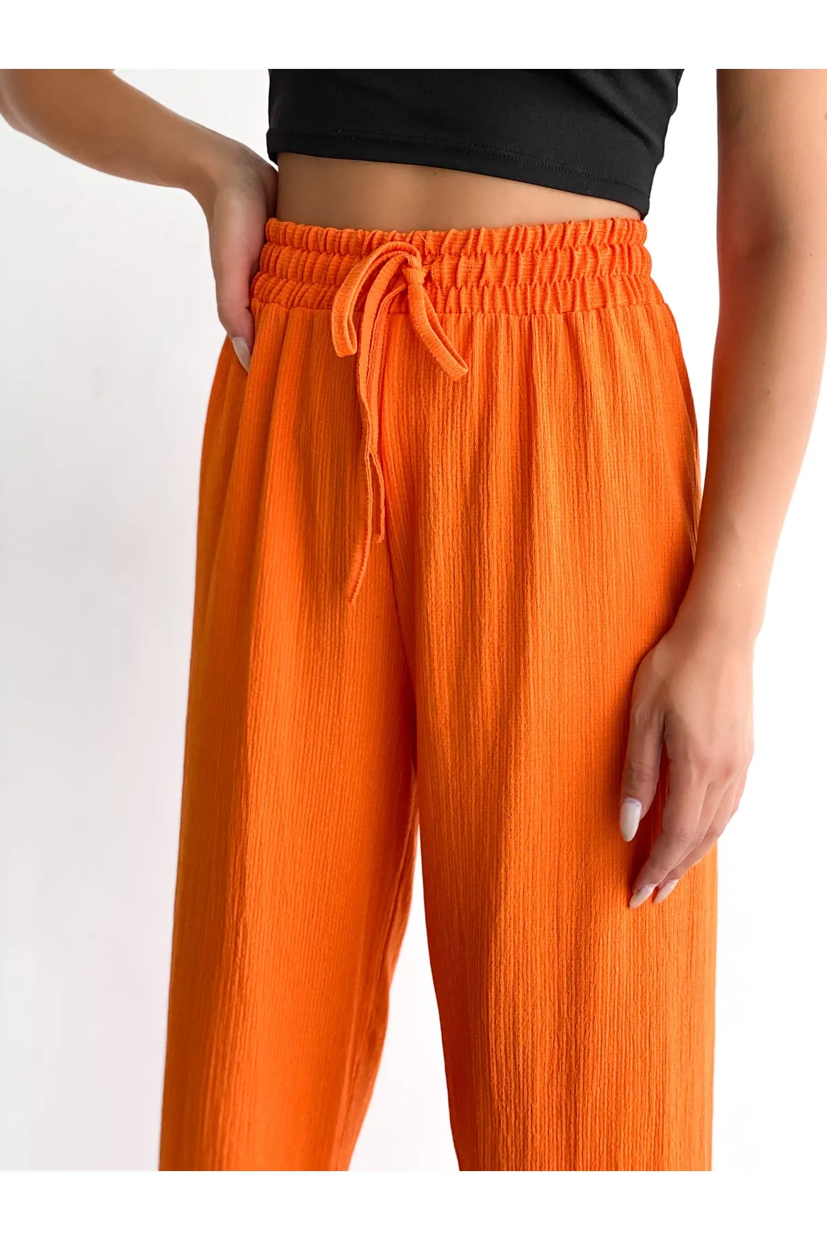 BEJNA  Orangefarbene Palazzo-Hose mit elastischem Bund für Damen