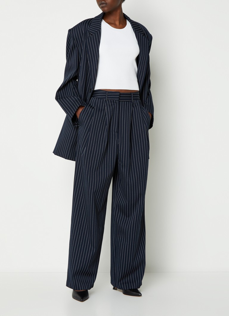 Pantaloni Ripley cu talie înaltă și croială largă, dintr-un amestec premium de lână cu dungi, disponibili la Frankie Shop.