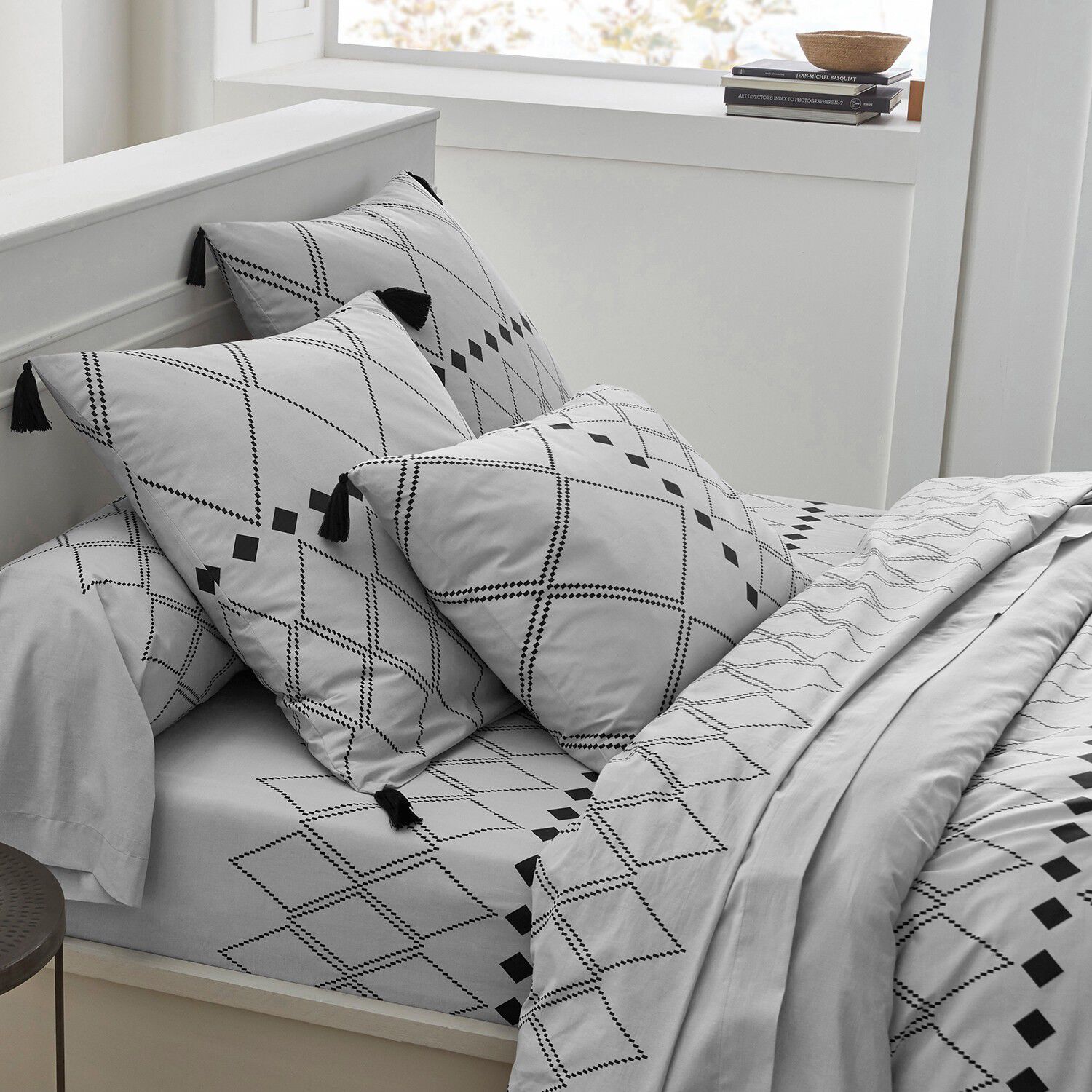 Linge de lit Massaï coton à motifs graphiques et finitions pompons