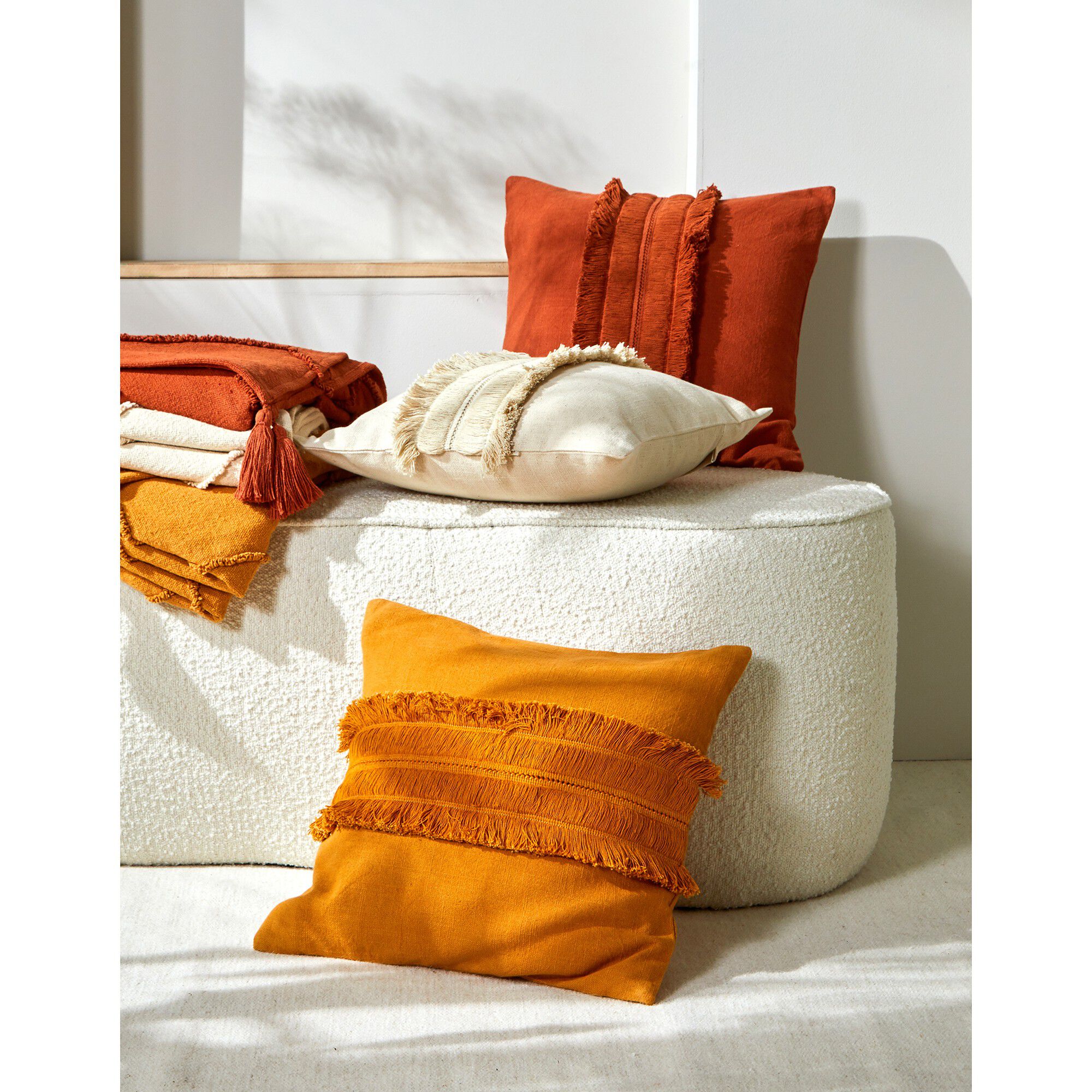 Coussin avec galon franges