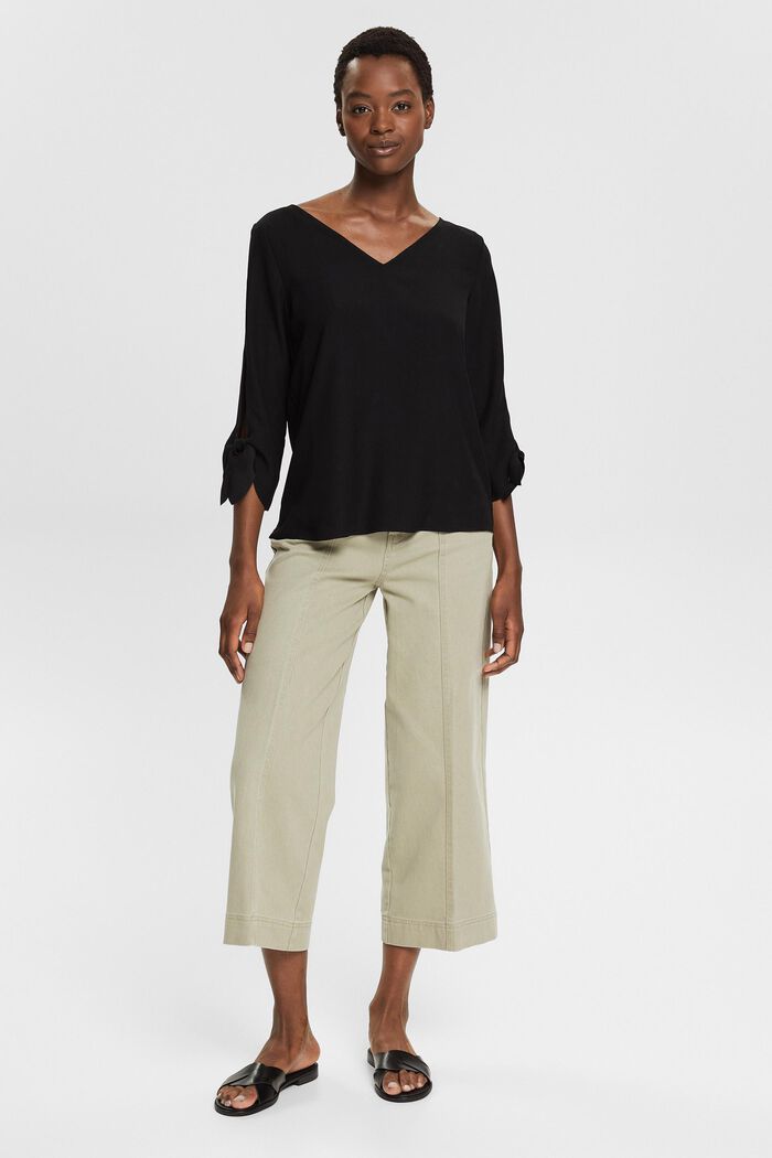 Stretch-Bluse mit offenen Kanten
