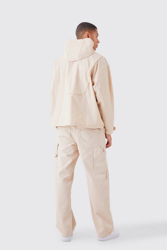 Regenjacke mit halbem Reißverschluss und Kapuze