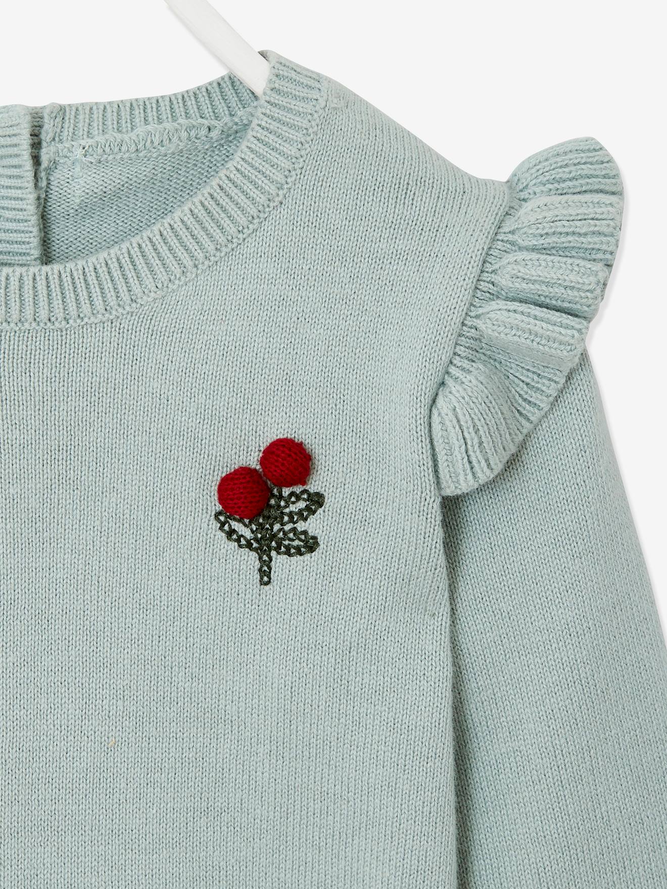 Pull à volants cerise bébé avec pompons rose