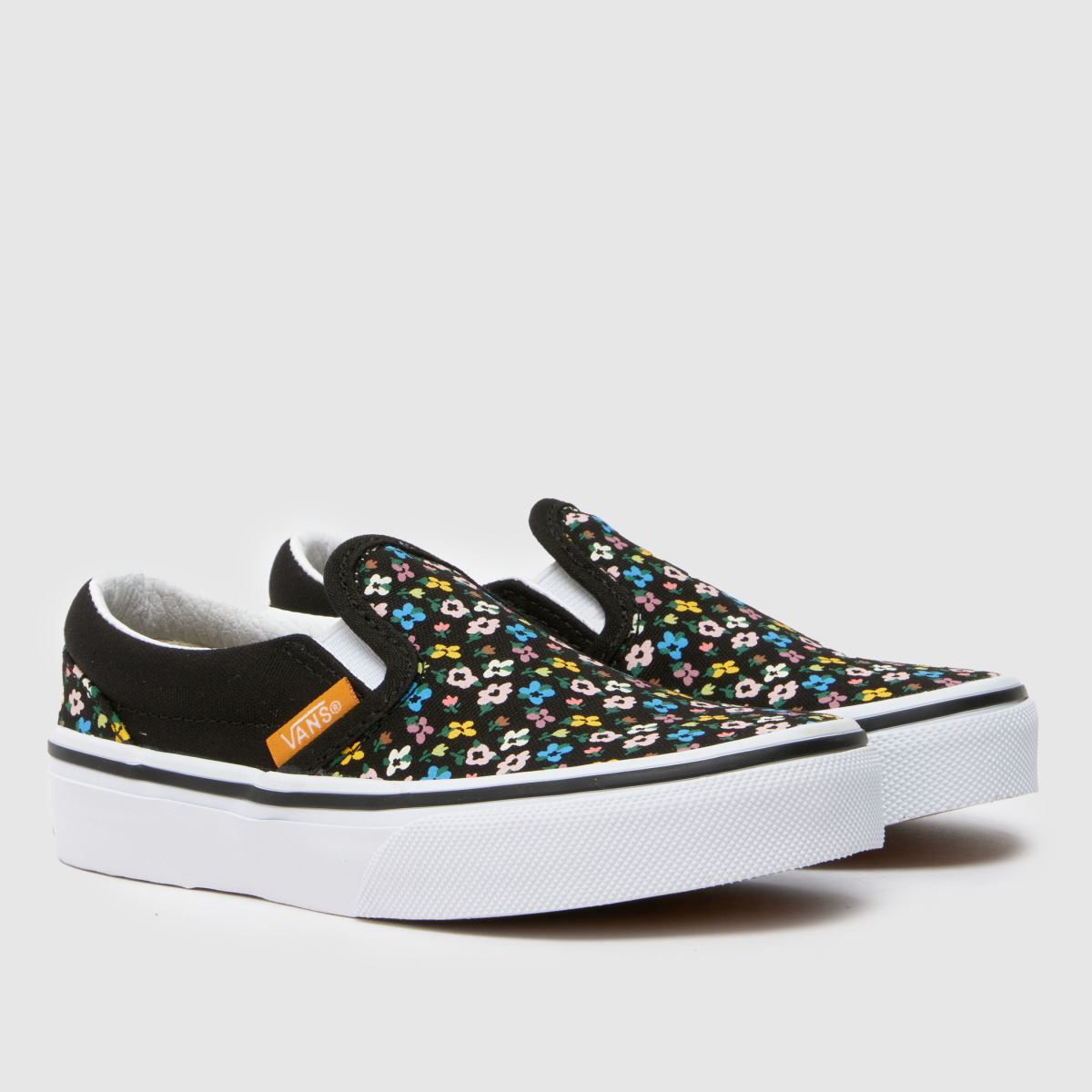 Vans svarta multifärgade klassiska slip-on flickor juniorskor