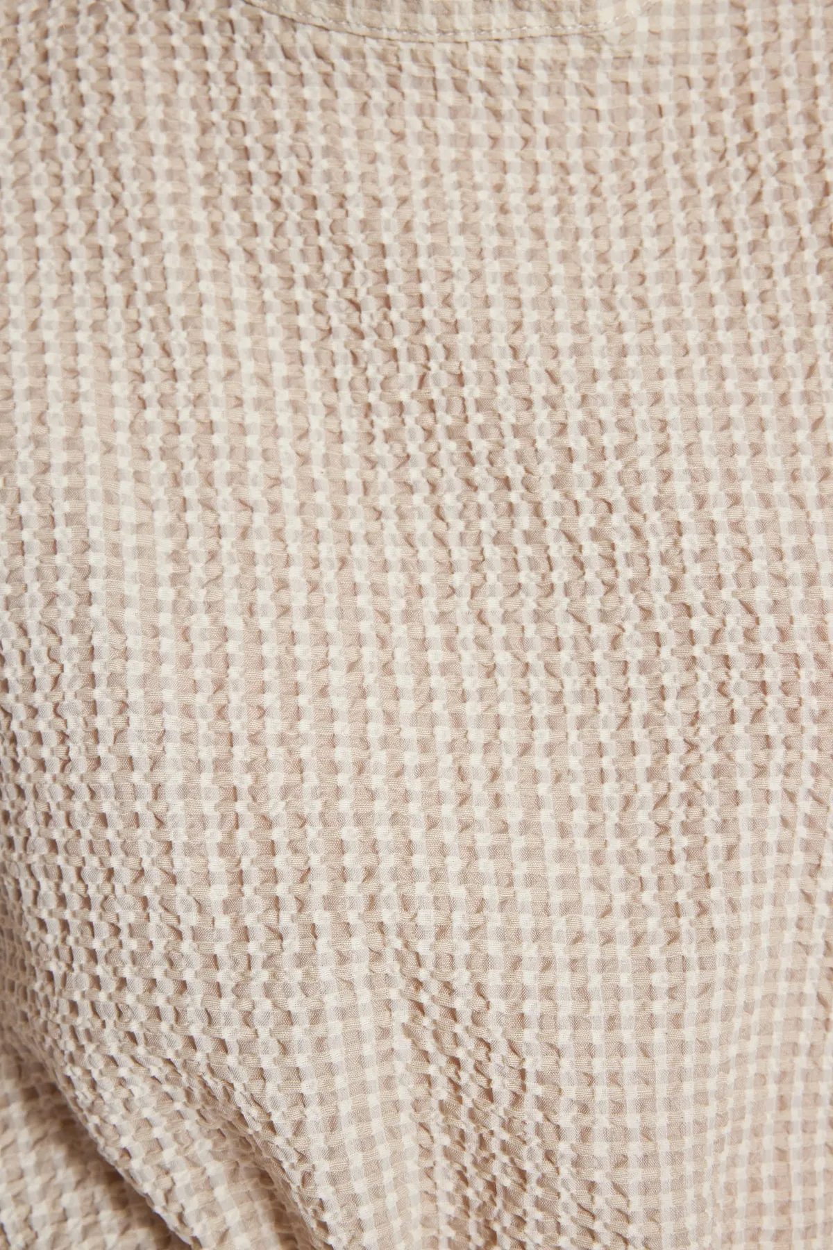 Trendyol Modest  Beiges Seersucker-Gewebekleid mit stoffbezogenem Bund TCTSS23EB00252