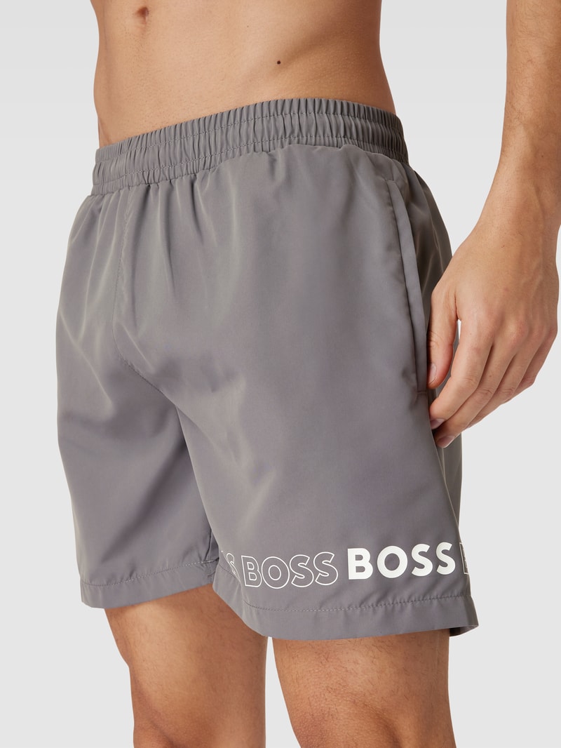 Badehose mit Label-Print Modell 'Dolphin' in mittelgrau