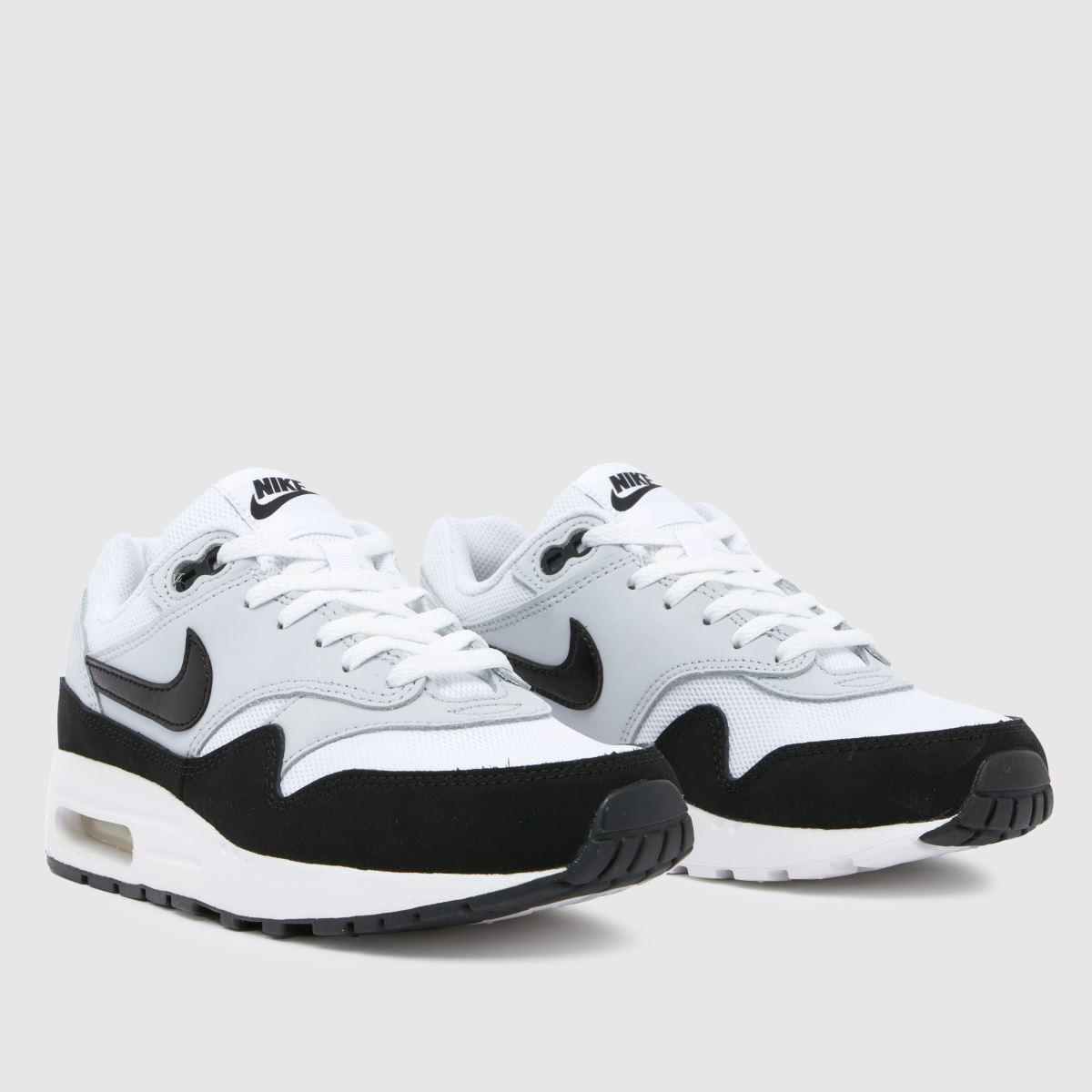 Nike svarta och vita Air Max 1 ungdomsskor