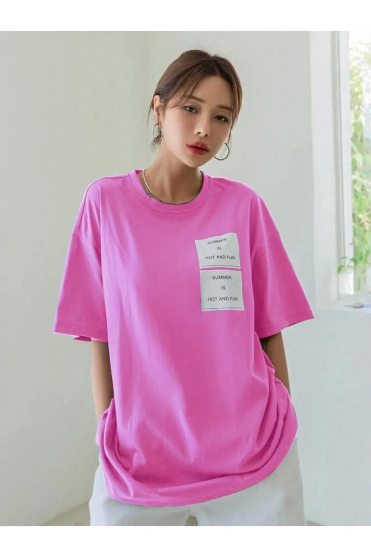 MOONBULL  Übergroßes rosa Hot And Fun-T-Shirt mit Aufdruck