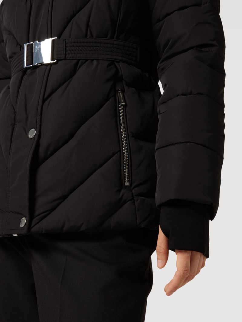 Steppjacke mit Kunstfellbesatz in schwarz
