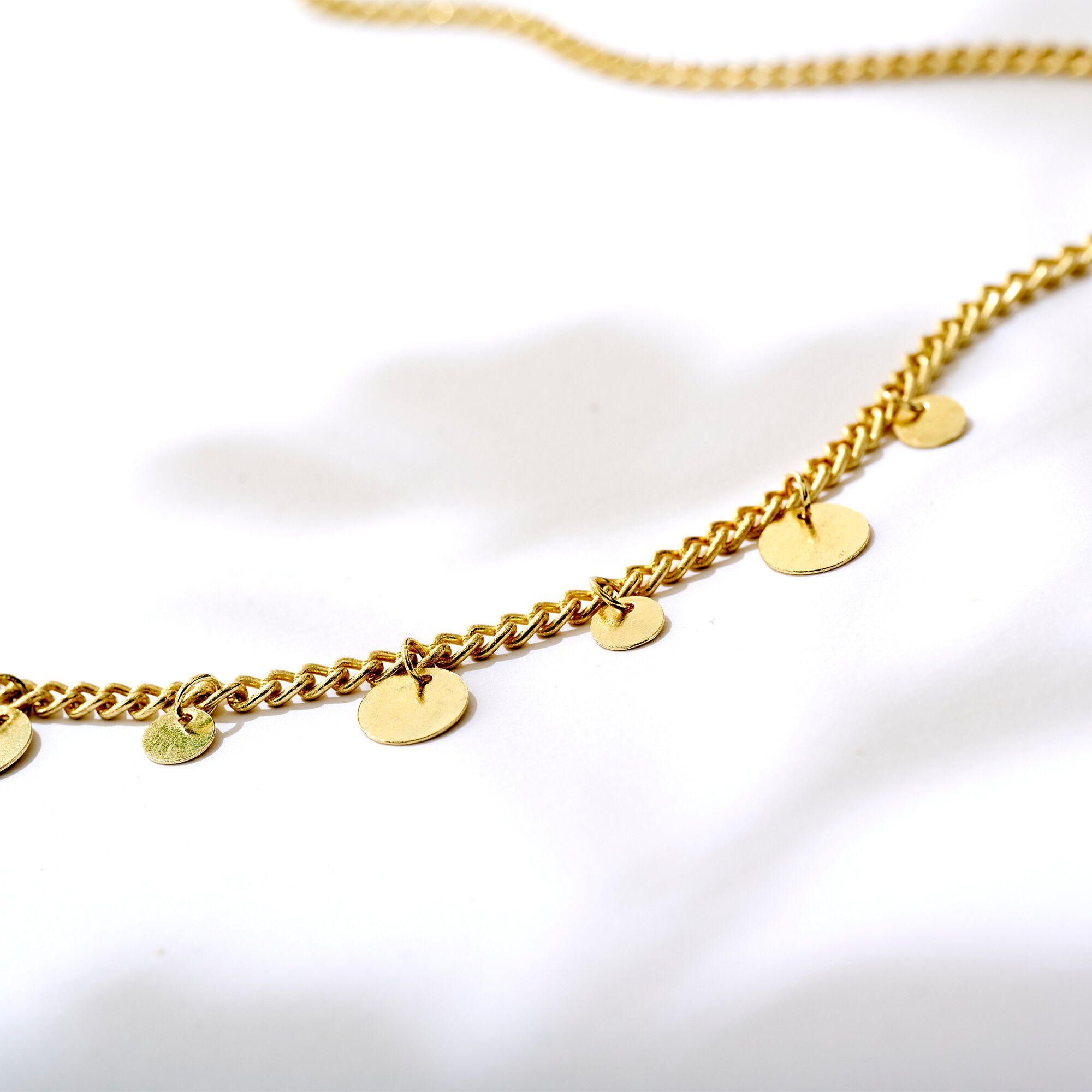 Collier breloques dorées