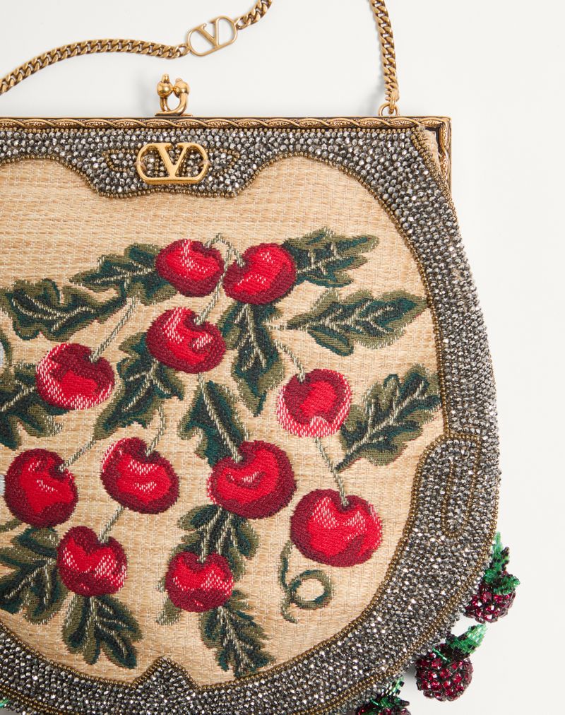 Clutch Valentino Garavani Nellcote Fairytales em jacquard de ráfia e miçangas Cherryfic
