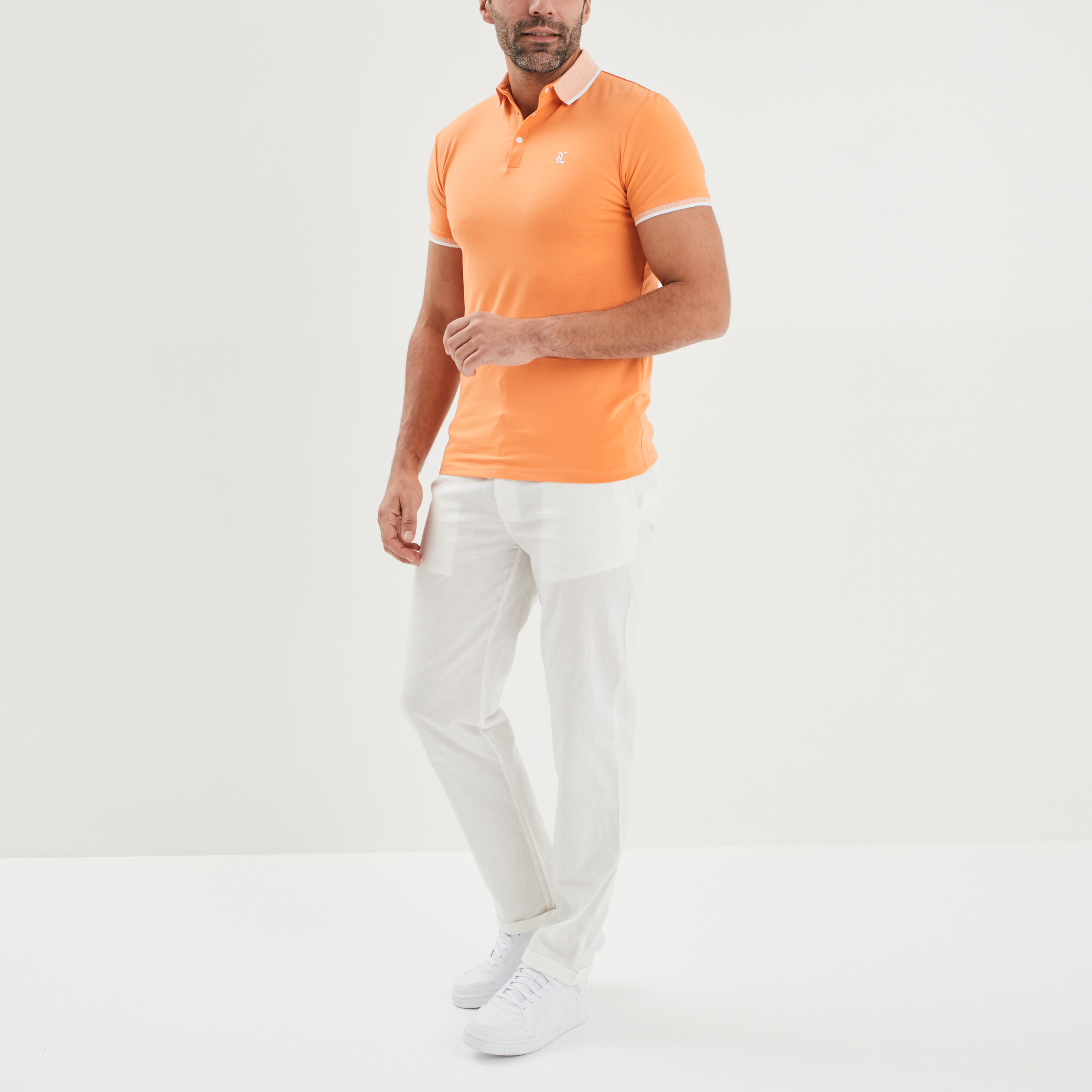Polo ajusté manches courtes orange clair homme | La Halle