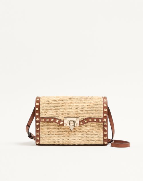 Valentino Garavani Rockstud kleine schoudertas van raffia