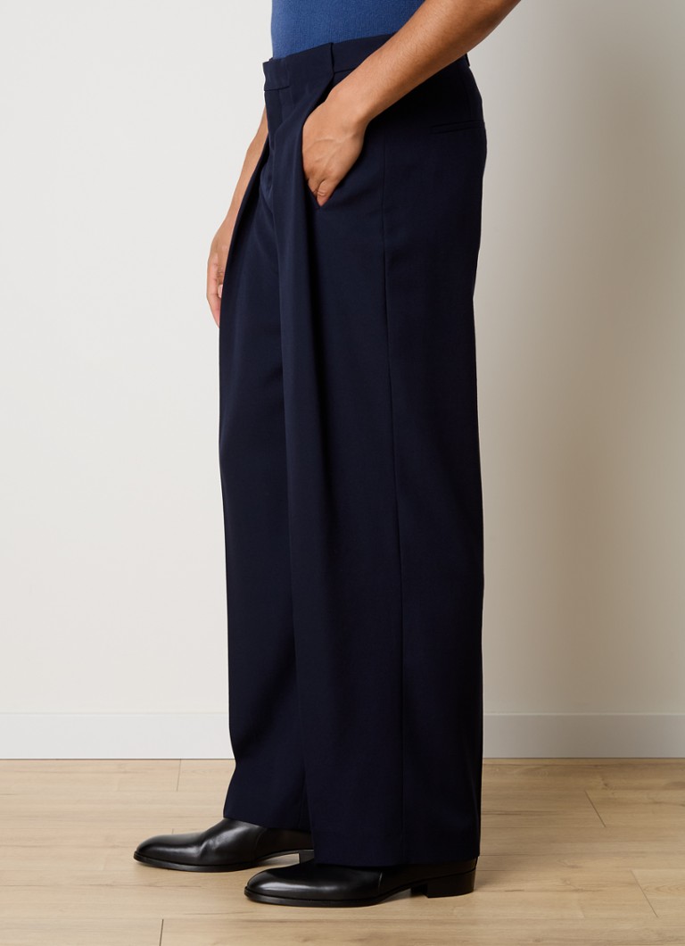 Pantaloni Balmain GDP din lână, croială lejeră, buzunare laterale.