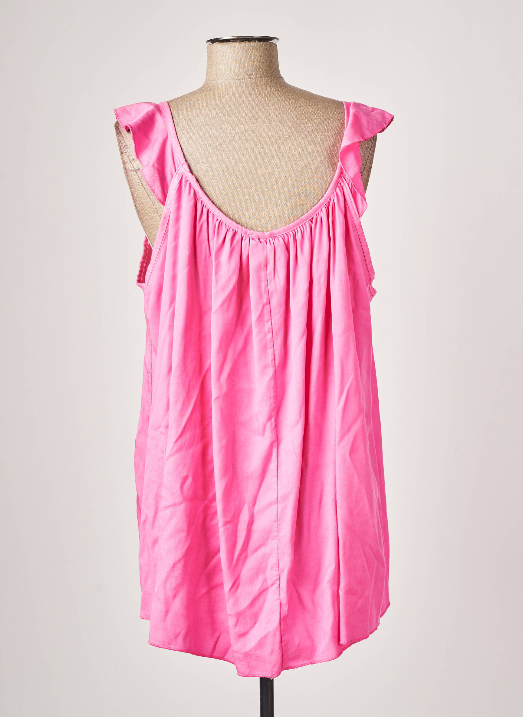 In April 1986 Tuniquemanchecourte Femme couleur rose