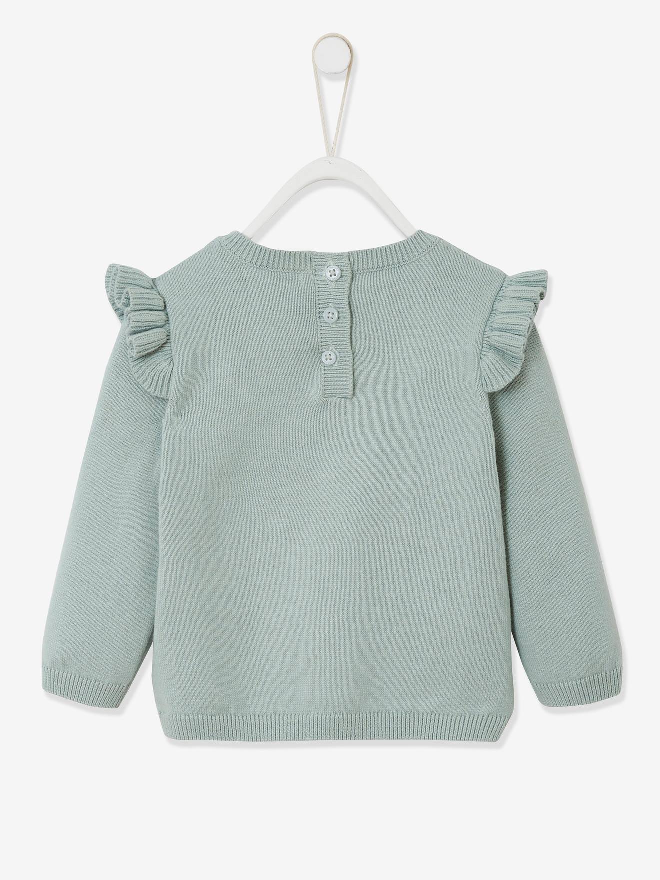 Pull à volants cerise bébé avec pompons rose