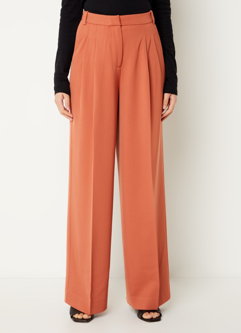 Calças Calvin Klein de cintura alta e pernas largas em mistura de lã.