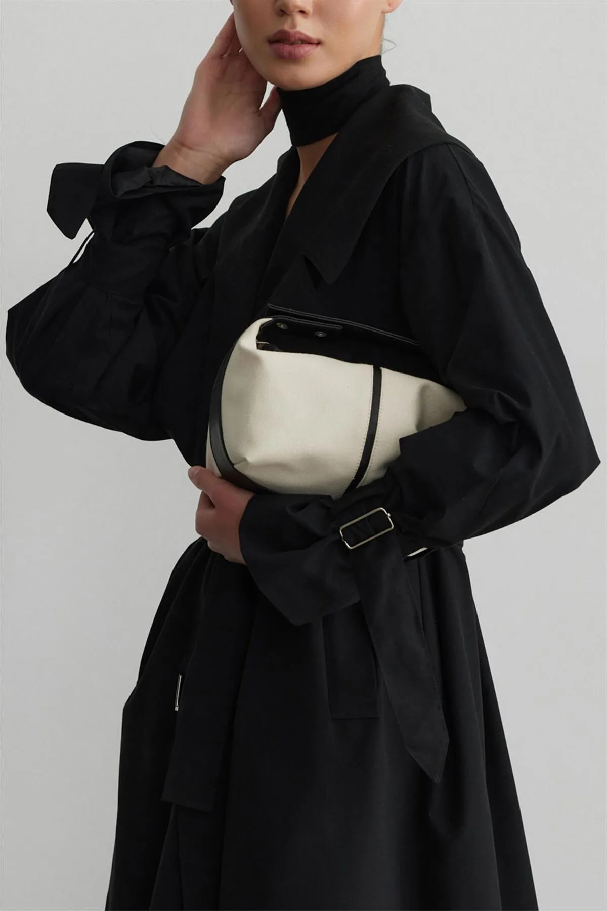 Suud Collection  Cremefarbene Mini-Tasche „Archi“