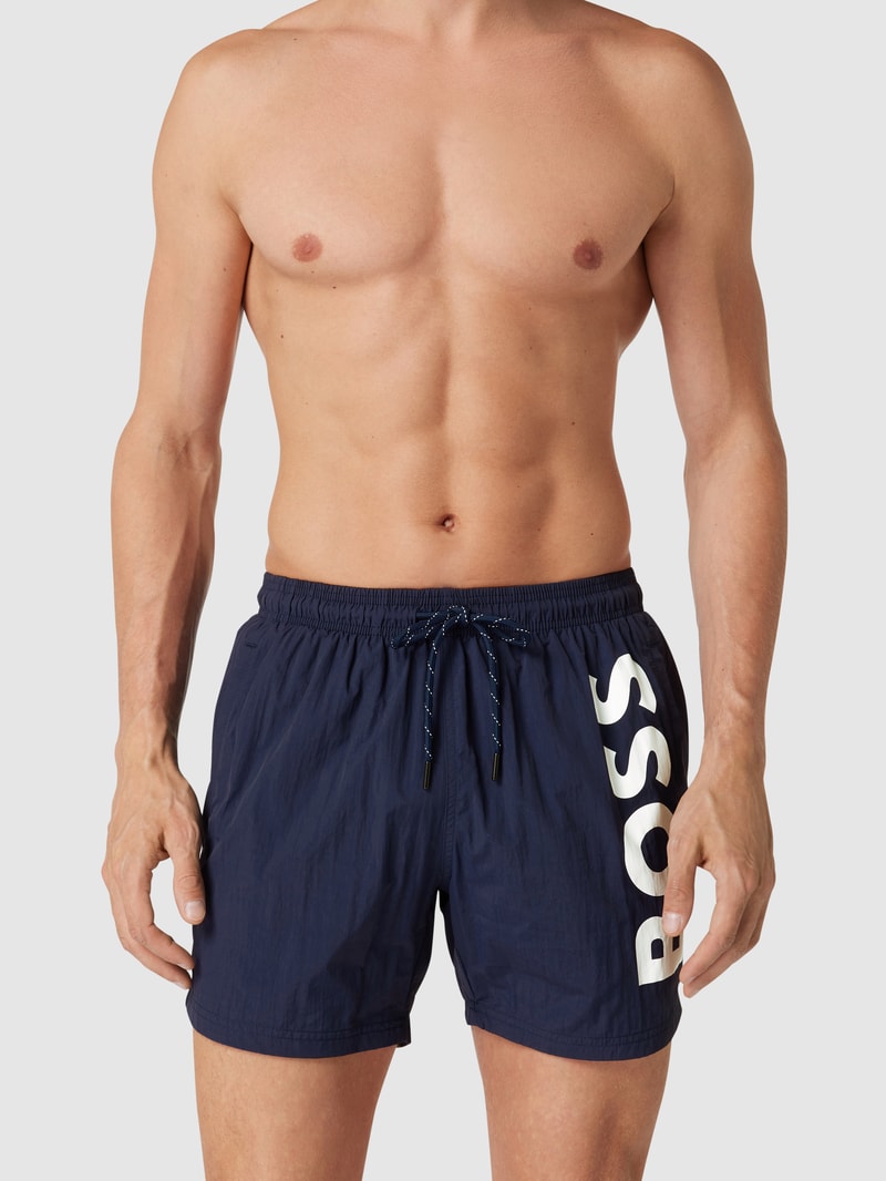 Badehose mit Label-Print Modell 'Octopus' in dunkelblau