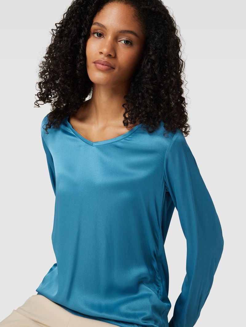 Bluse mit V-Ausschnitt in petrol