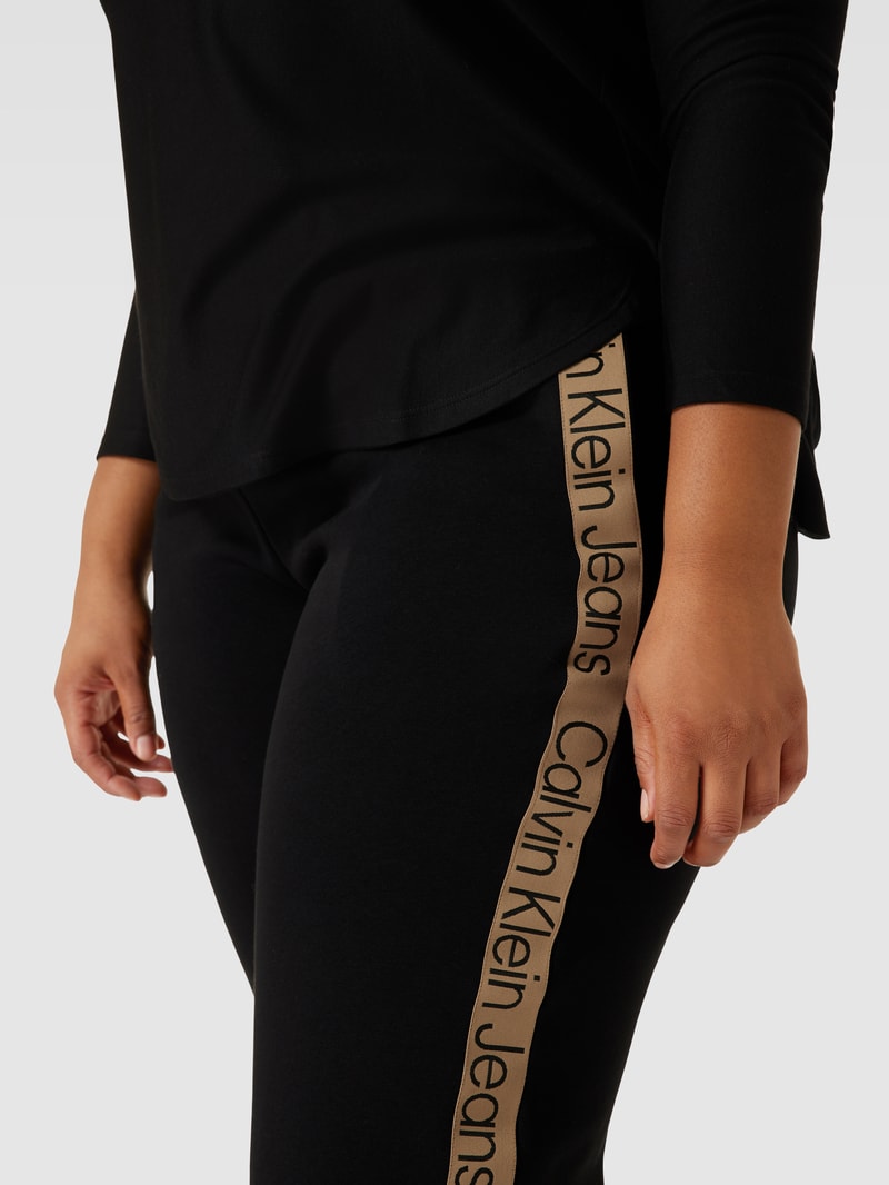PLUS SIZE Sweatpants mit Galonstreifen in schwarz