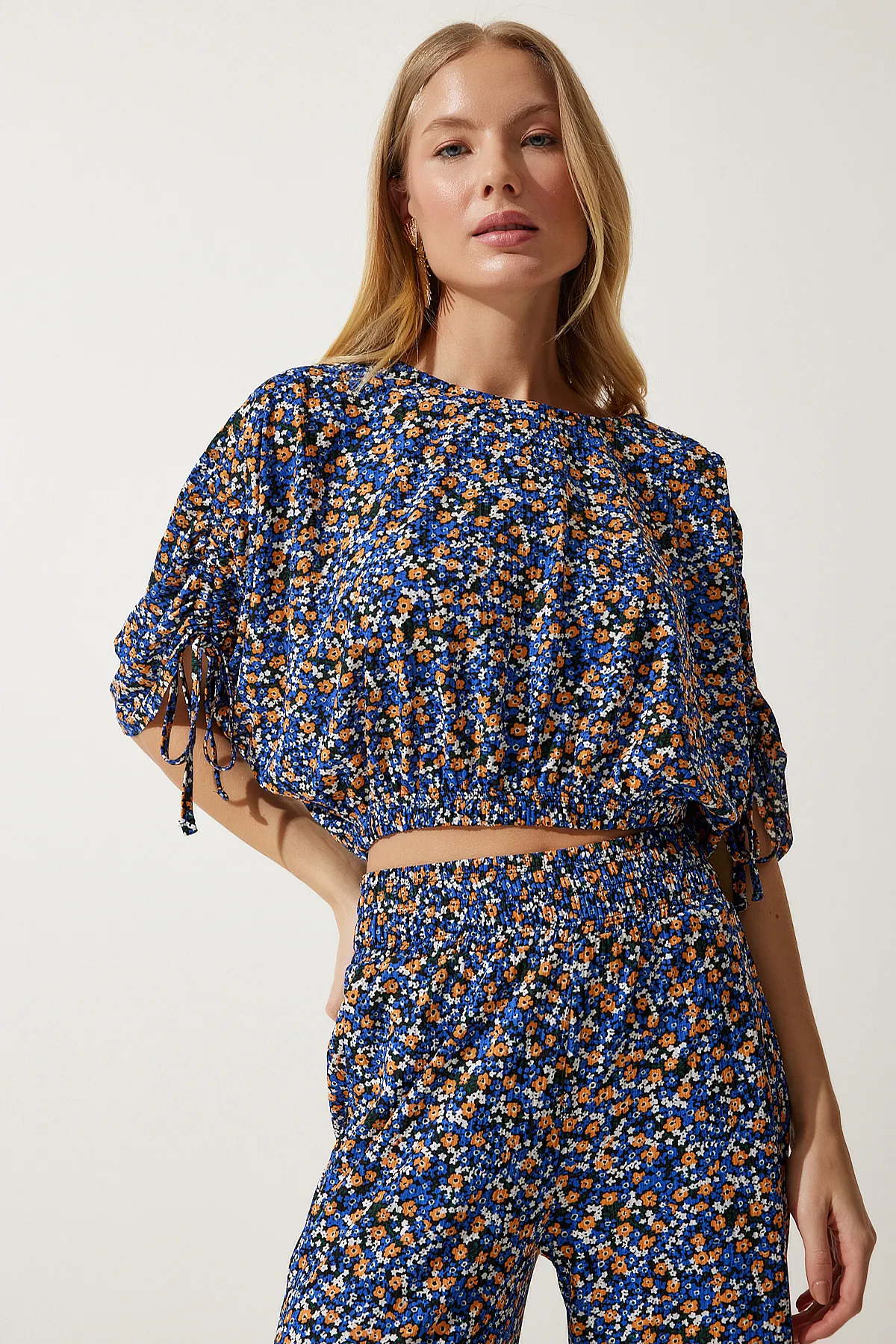Happiness İstanbul  Blau-orange gemusterte Palazzo-Strickbluse für Damen MC00264