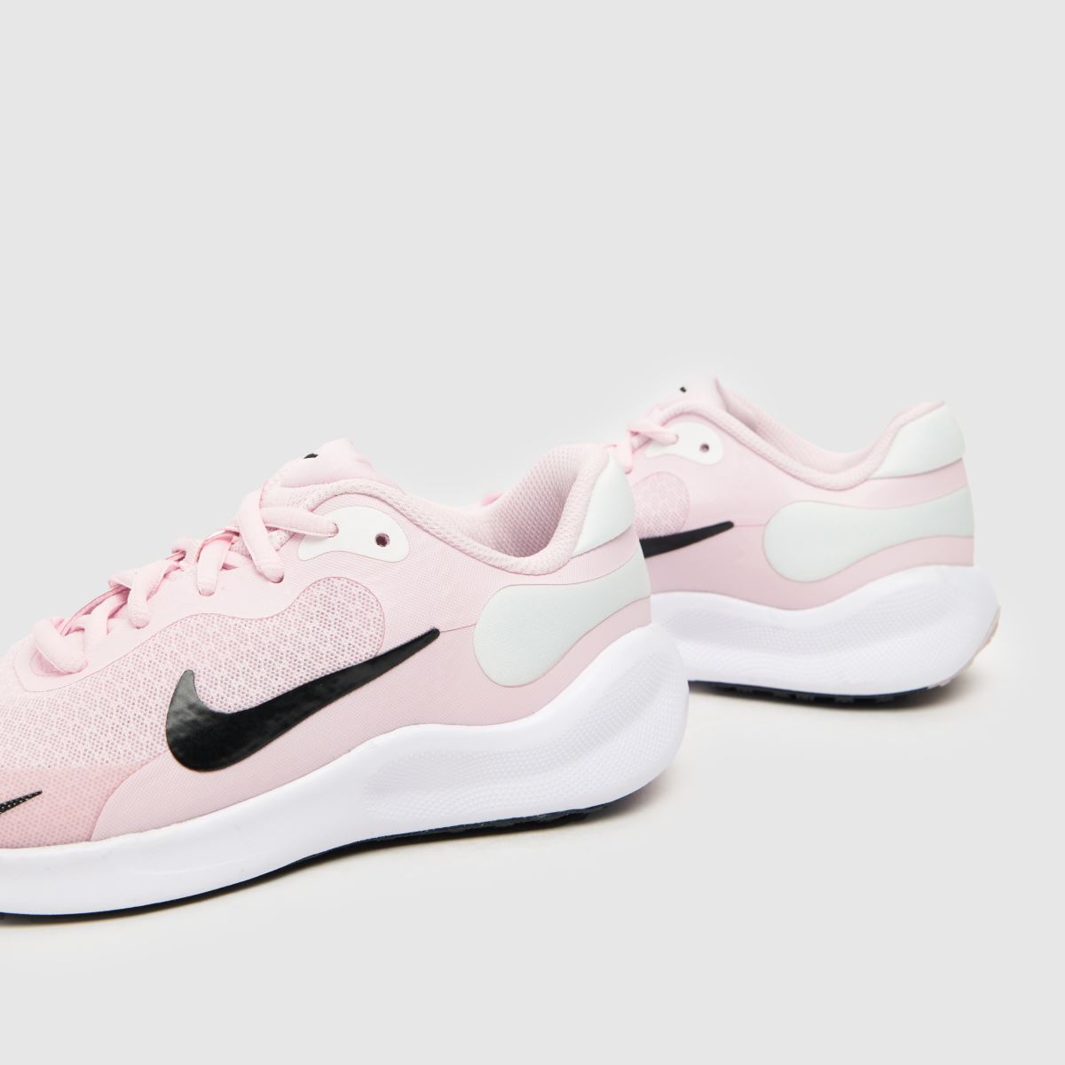 Nike ljusrosa Revolution 7 flickor ungdomsskor